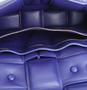 Borsa a tracolla Bottega Veneta Cassette in pelle intrecciata viola
