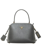 PRADA | SAFFIANO LEATHER MATINÉE HANDBAG, WORN BY LEXI BOLING. ITEM NOT FEATURED IN THE SHOW
